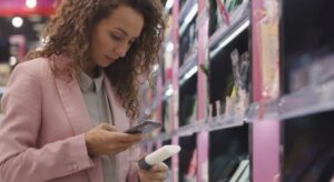 customer scanning qr code supermarket